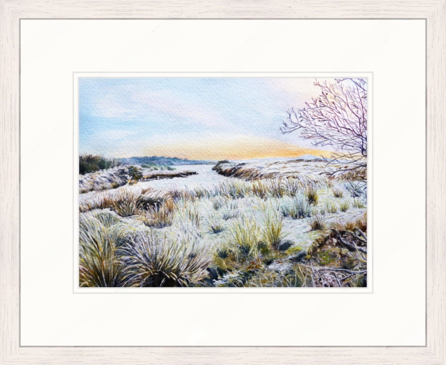 Framed artwork of a winter landscape with frost-covered ground and trees.